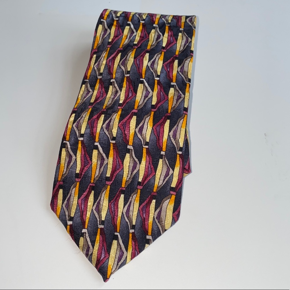 J. Garcia Tie‎